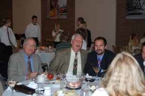The author (far right) and his father (center) at a Bar Mitzvah in 2008